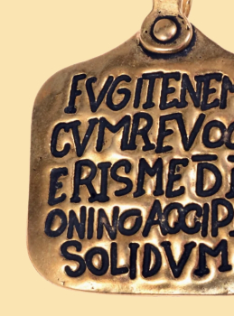 Römischer Sklaven-Anhänger - Bronze